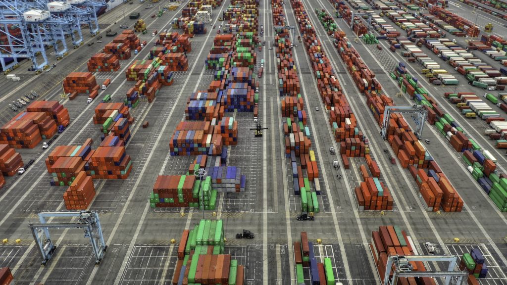 An aerial shot of large shipping containers area
